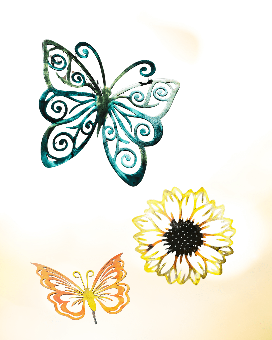 metal butterflies and sunflower, displayed on a light orange and white background