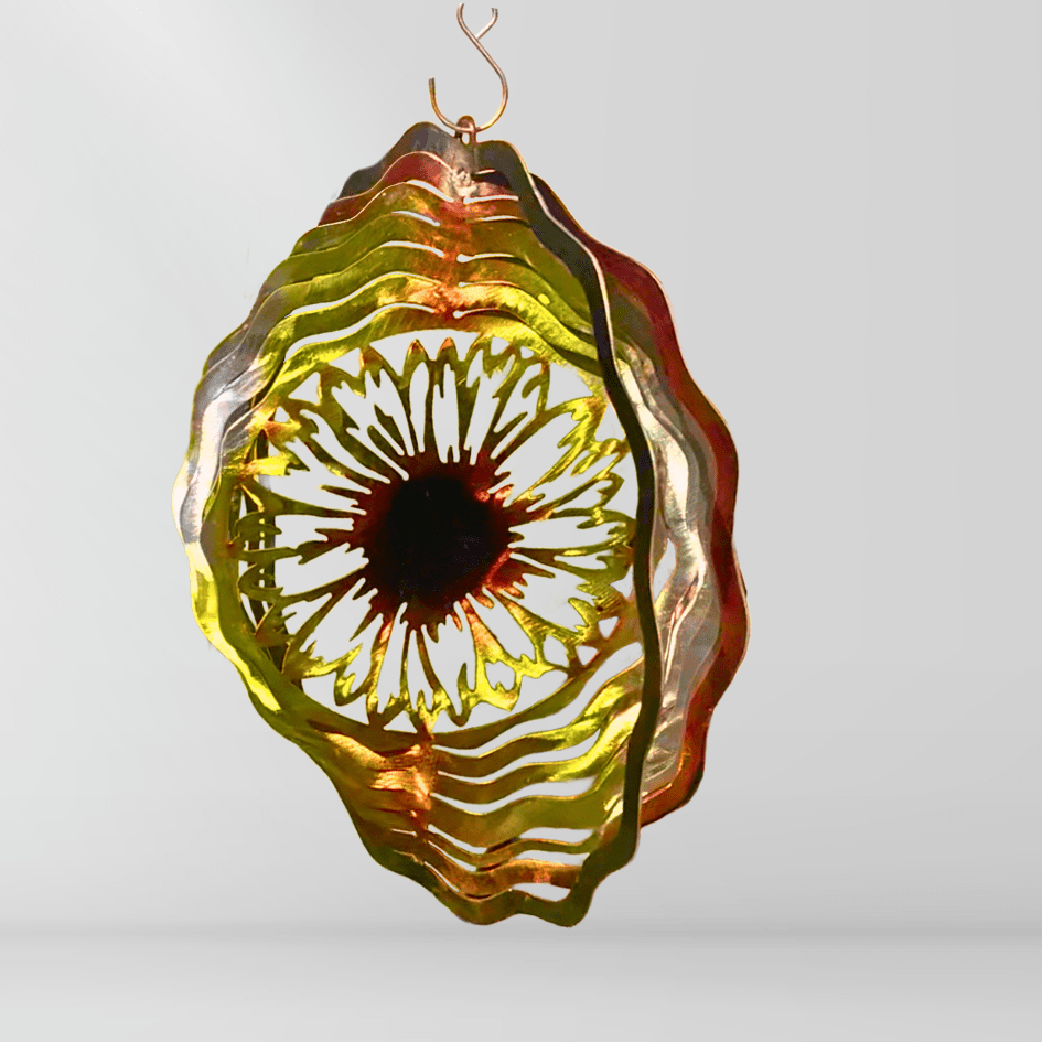Decorative metal wind chime spinner with wavy sunflower design on a plain background