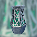 Decorative vase with green and silver design against a blurred natural background