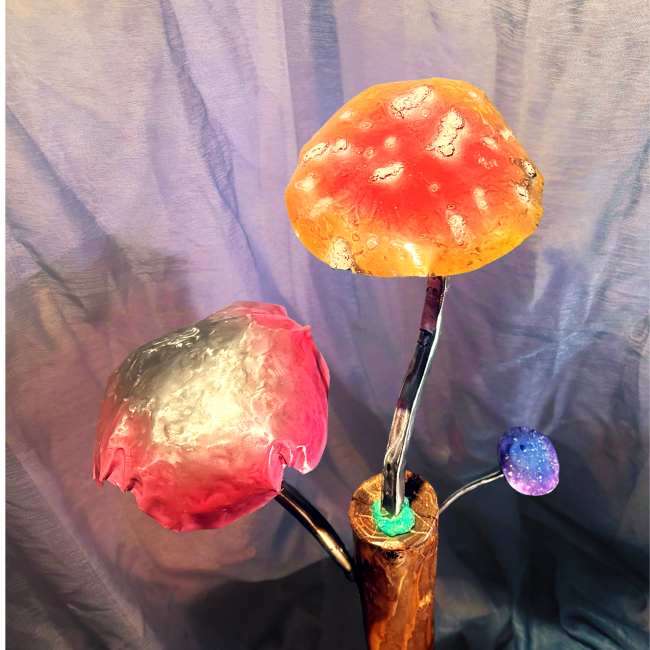 Colorful mushroom-shaped objects on a textured fabric background