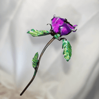 purple Metal rose with leaves on light background